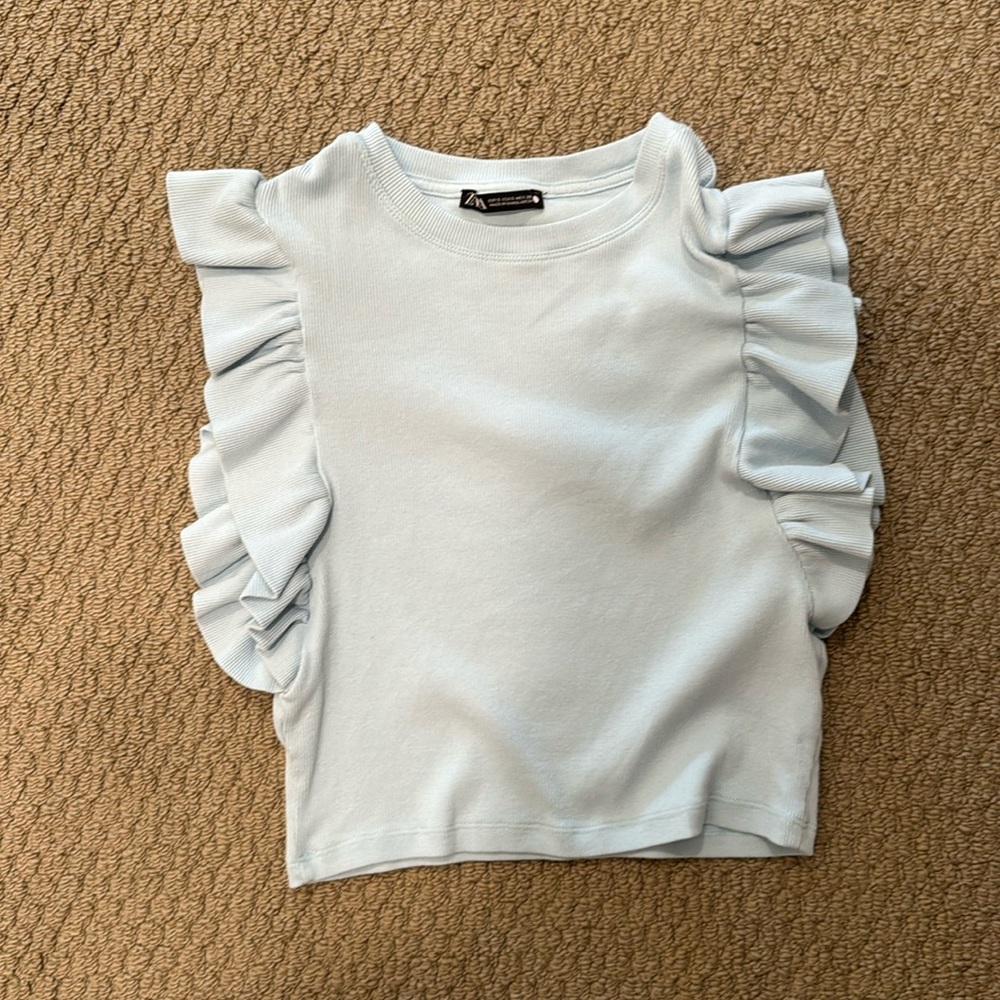 zara blue top with ruffles/ worn once